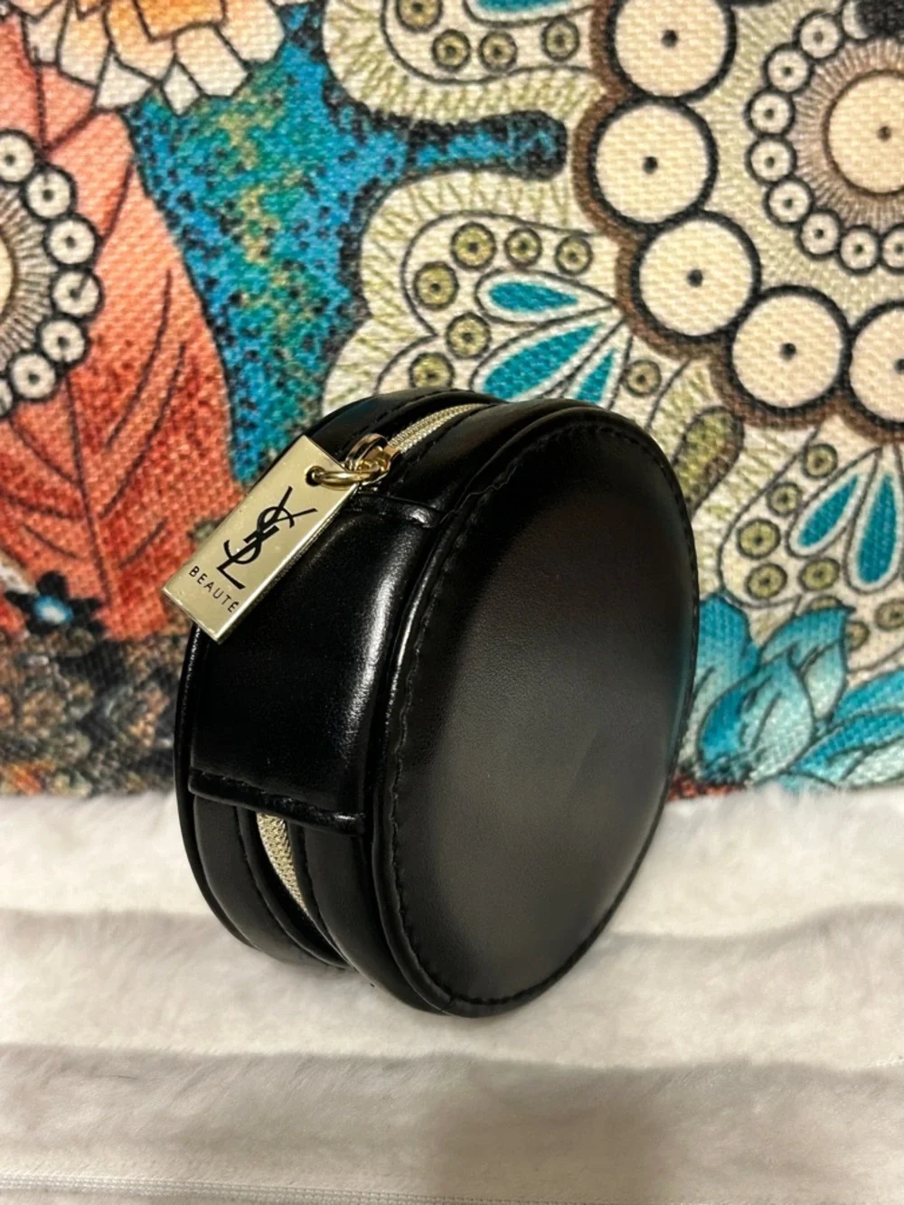 Yves Saint Laurent Black Round Leather Travel Case with Gold Tag